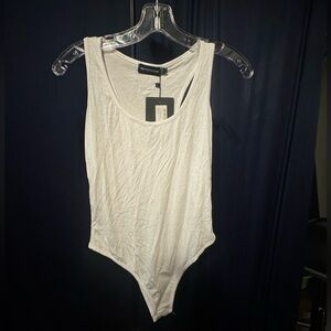 NWT white racer back bodysuit